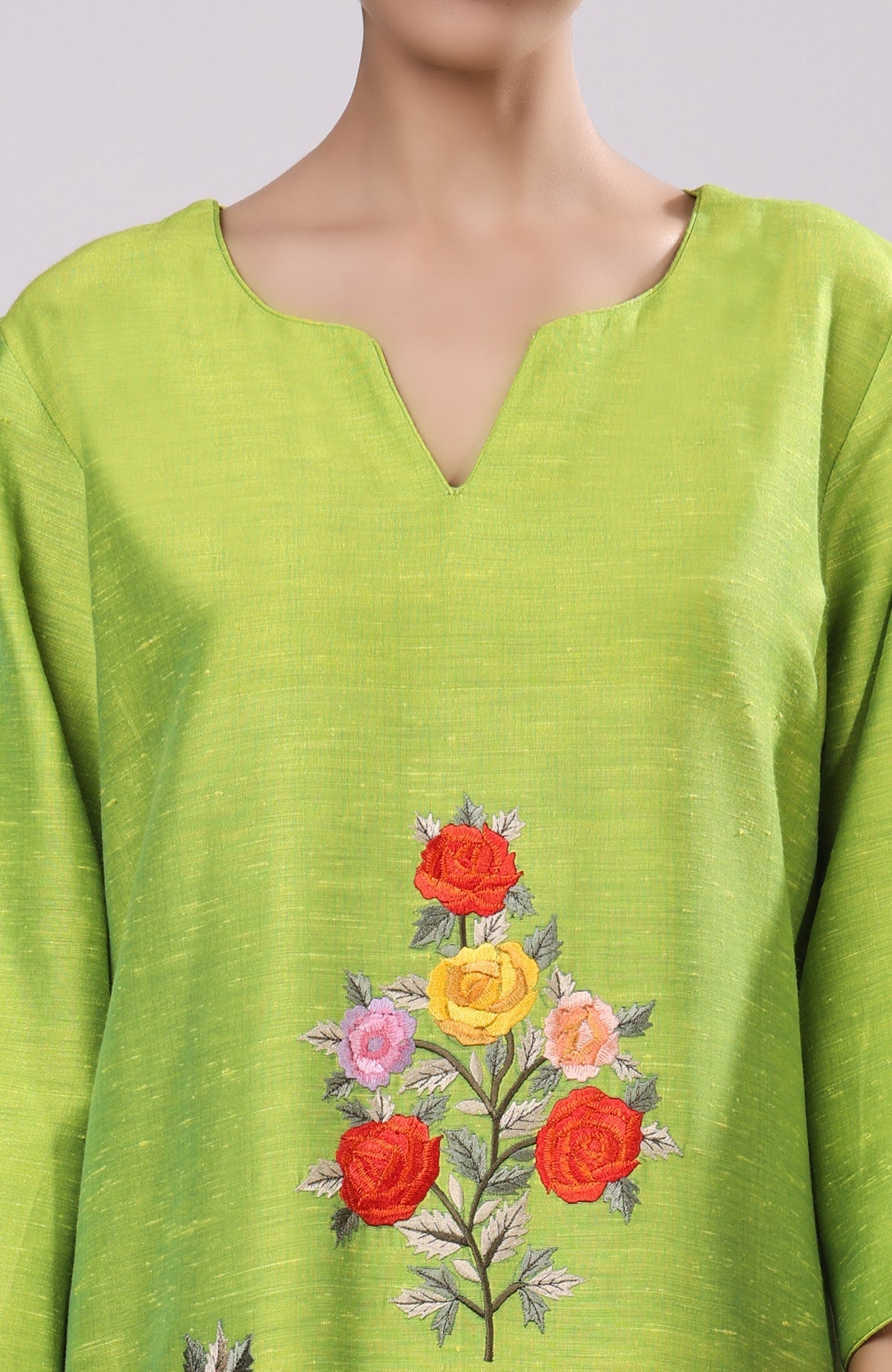 Citrus green co-ord with Parsi Gara floral embroidery on front and wide-leg pants.