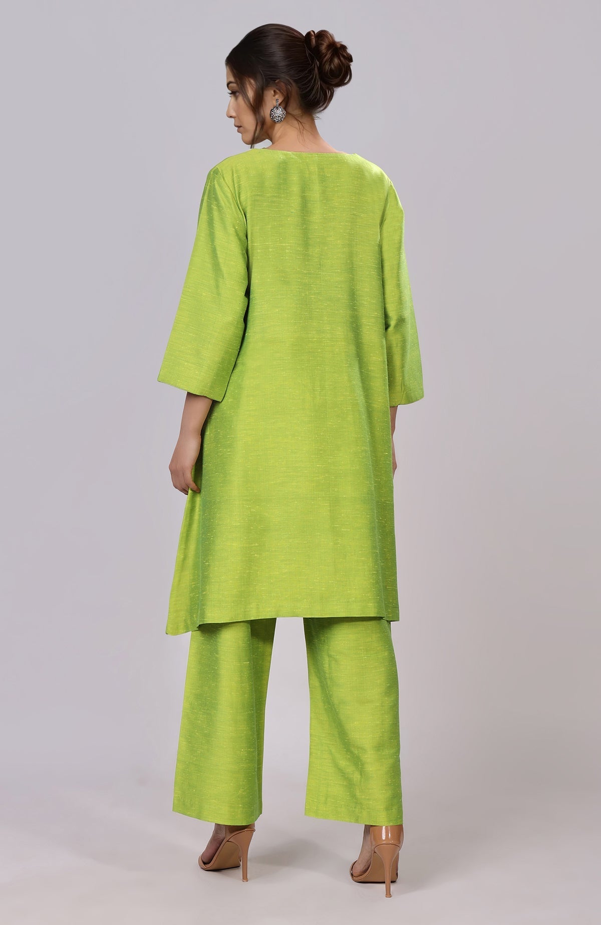 Citrus green co-ord with Parsi Gara floral embroidery on front and wide-leg pants.