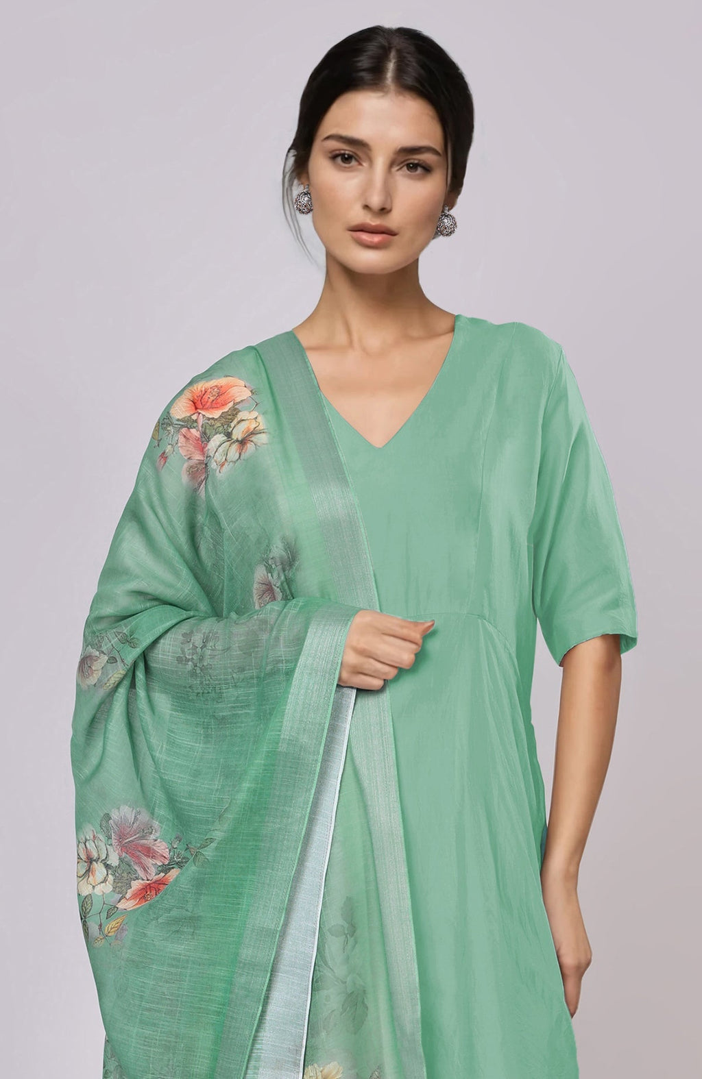 Dusty jade green floral linen dupatta with a matching suit.