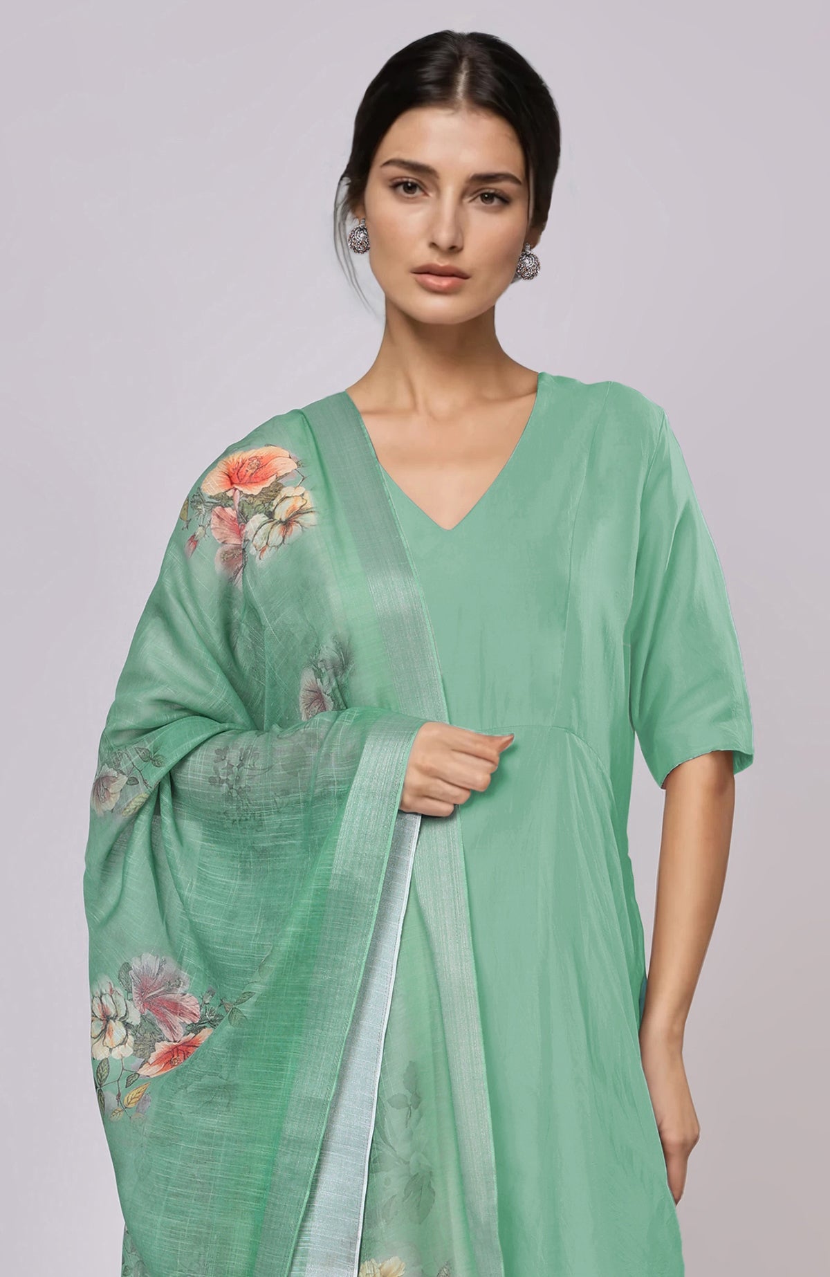Dusty jade green floral linen dupatta with a matching suit.