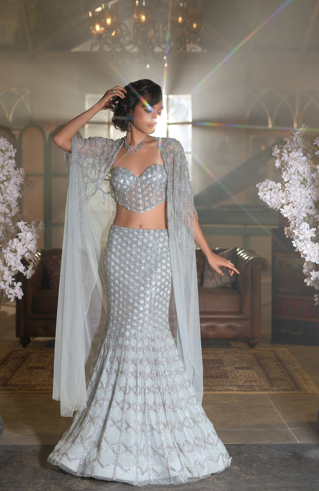 Illusion blue crystal hand-embroidered mermaid lehenga set with cape and silver hexagonal details