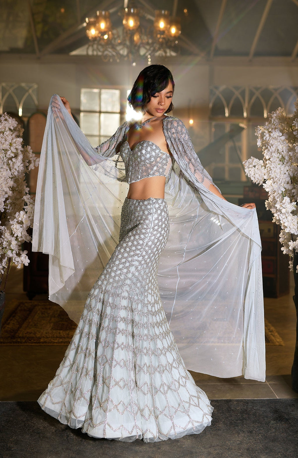 Blue crystal hand-embroidered mermaid lehenga with cape and intricate silver hexagonal beadwork