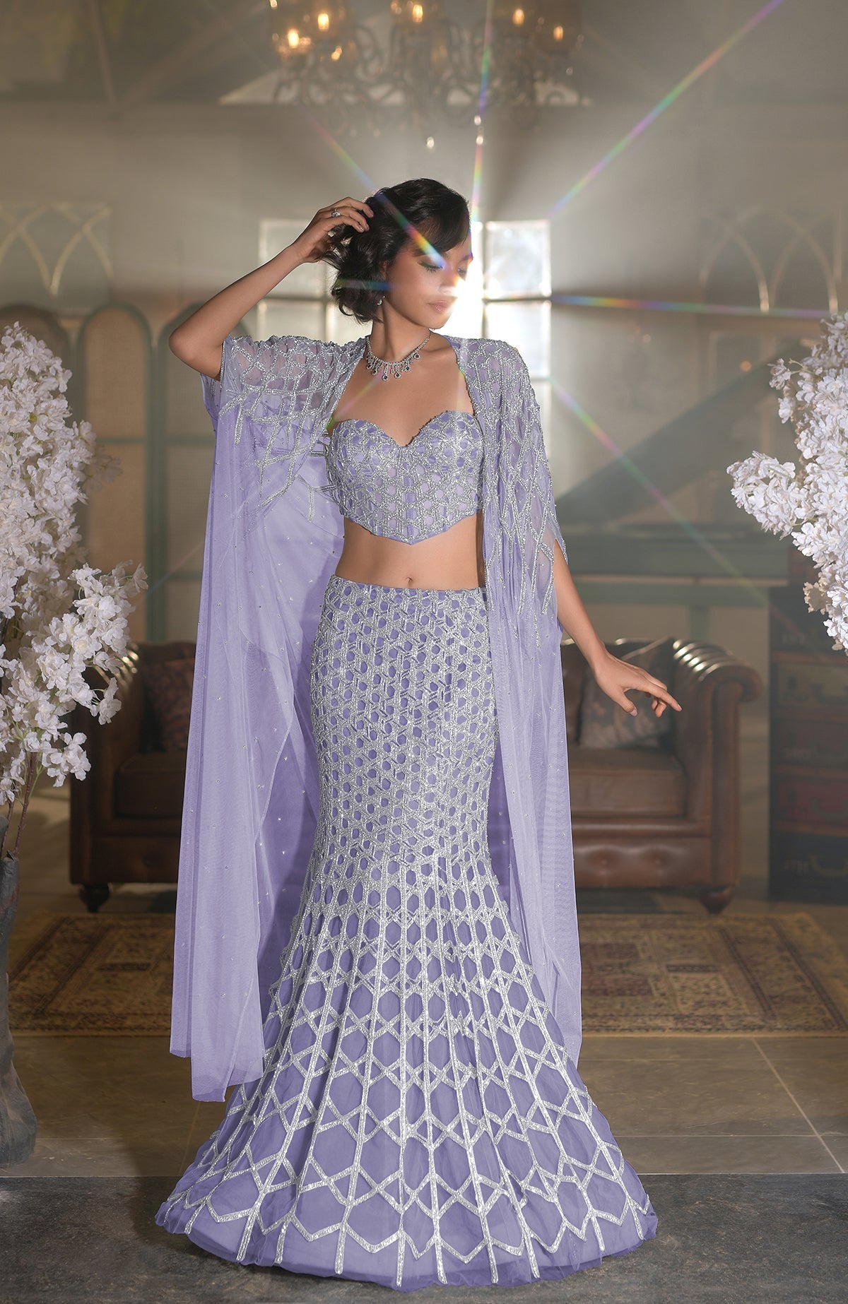 Blue crystal hand-embroidered mermaid lehenga set with cape and intricate silver hexagonal patterns