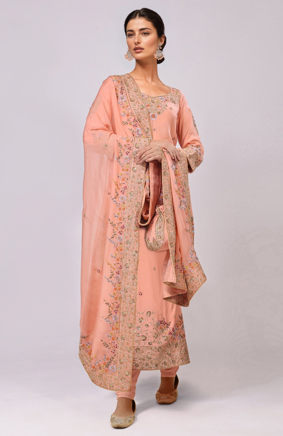 A woman models an Elder Berry Marori and Resham Hand Embroidered Kurta Set.