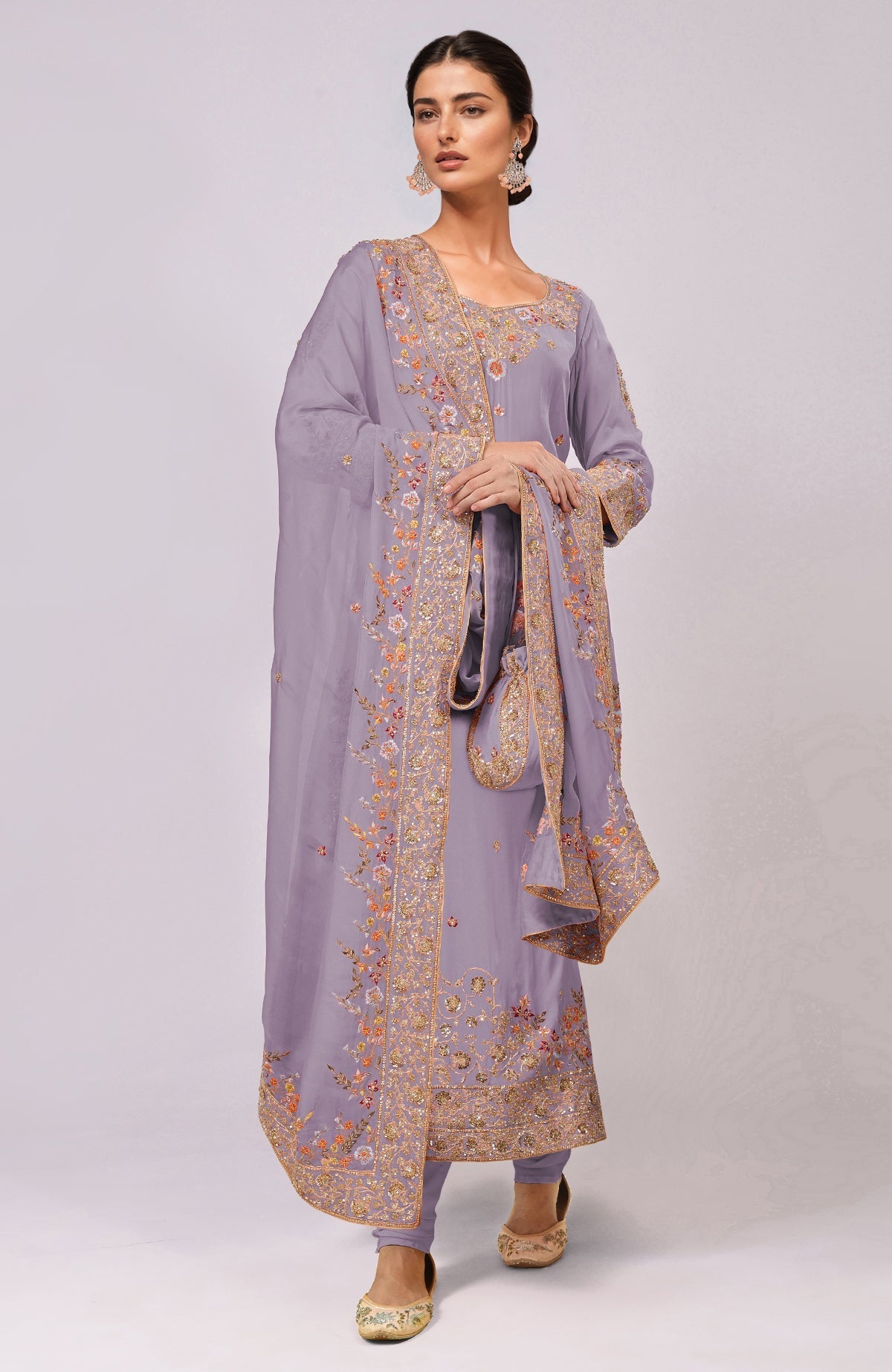 A woman models an Elder Berry Marori and Resham Hand Embroidered Kurta Set.