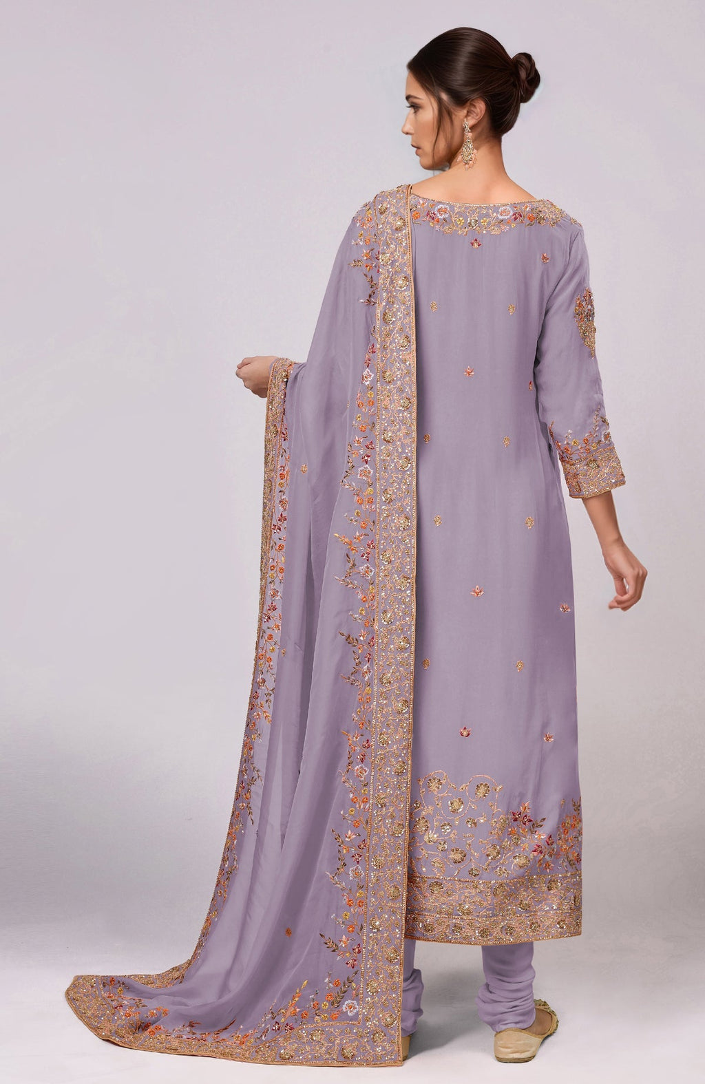 A woman models an Elder Berry Marori and Resham Hand Embroidered Kurta Set.