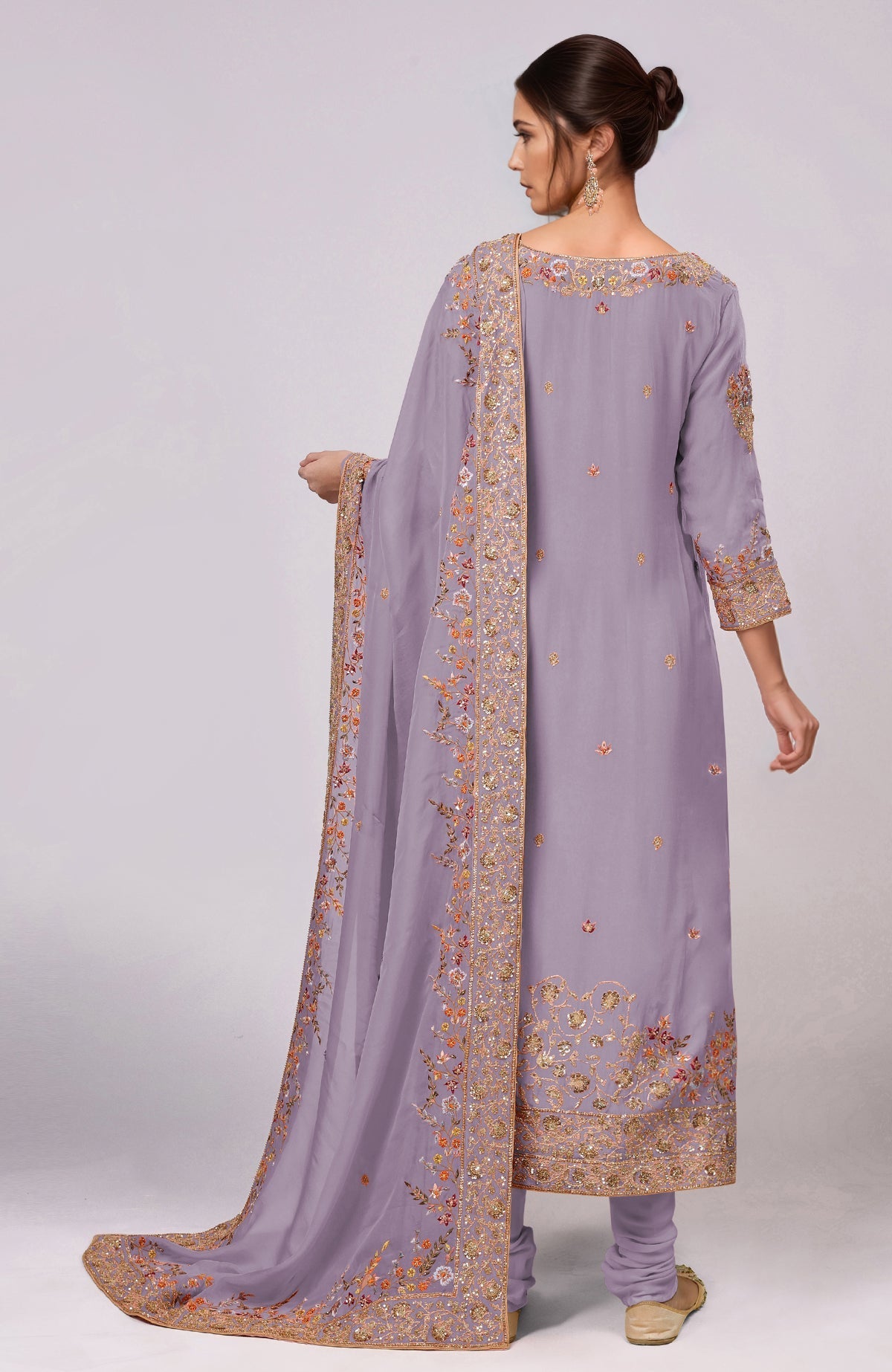 A woman models an Elder Berry Marori and Resham Hand Embroidered Kurta Set.