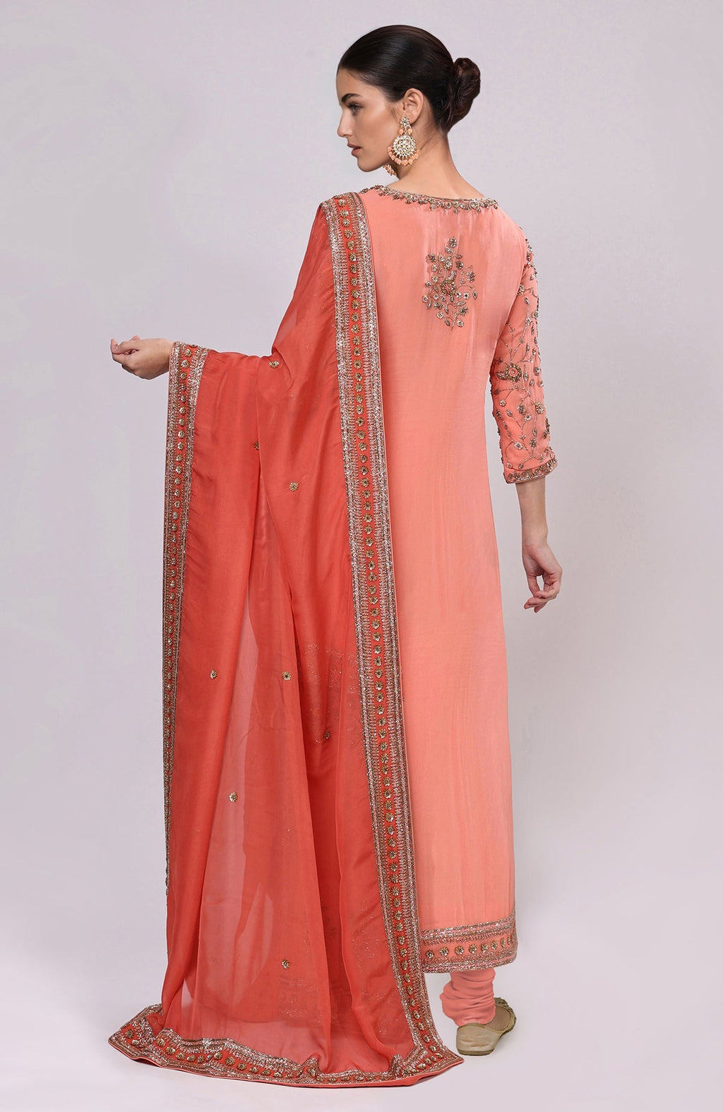 Salmon kurta set with dabka and zardozi embroidery.