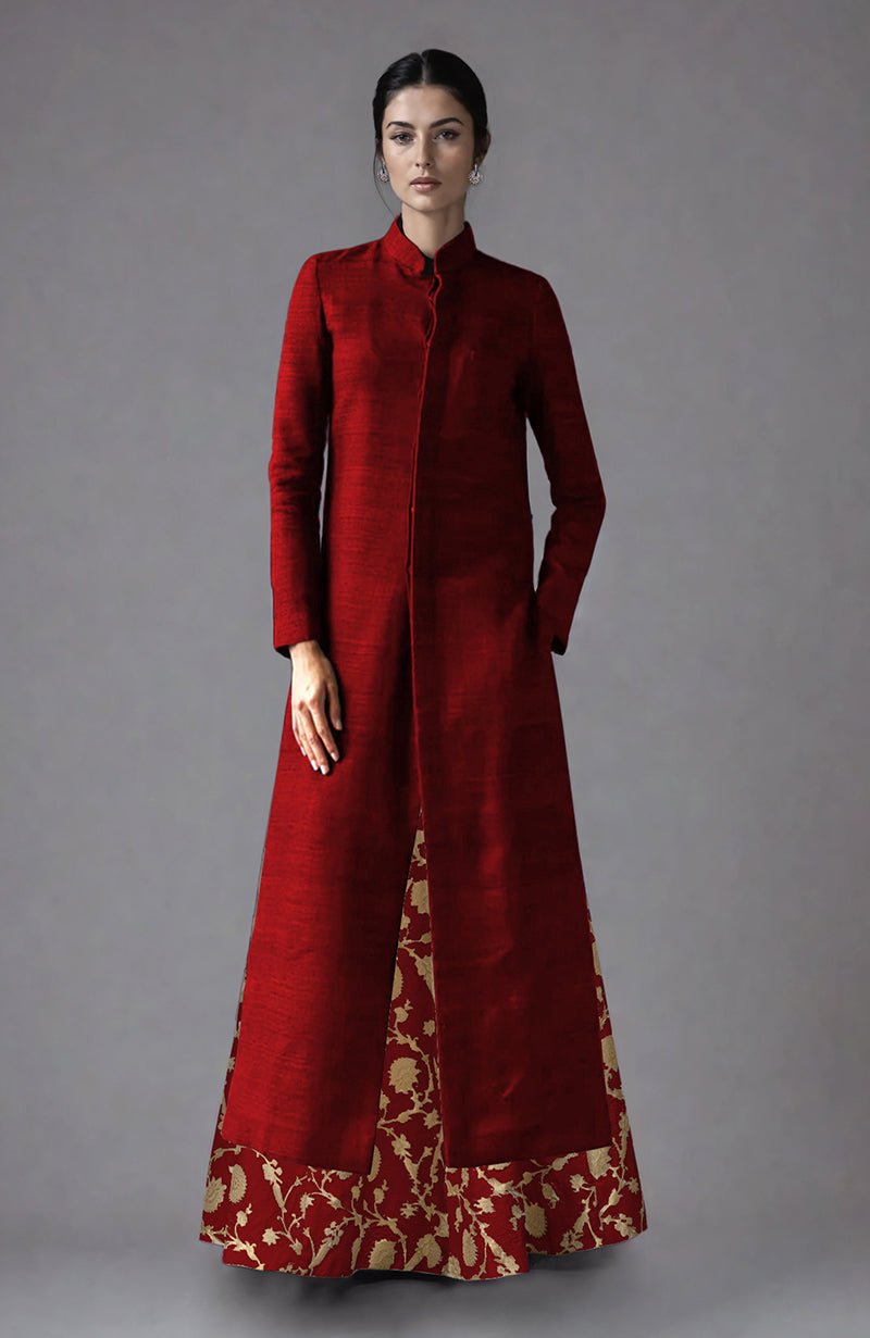 Red raw silk jacket with a banarasi brocade skirt.