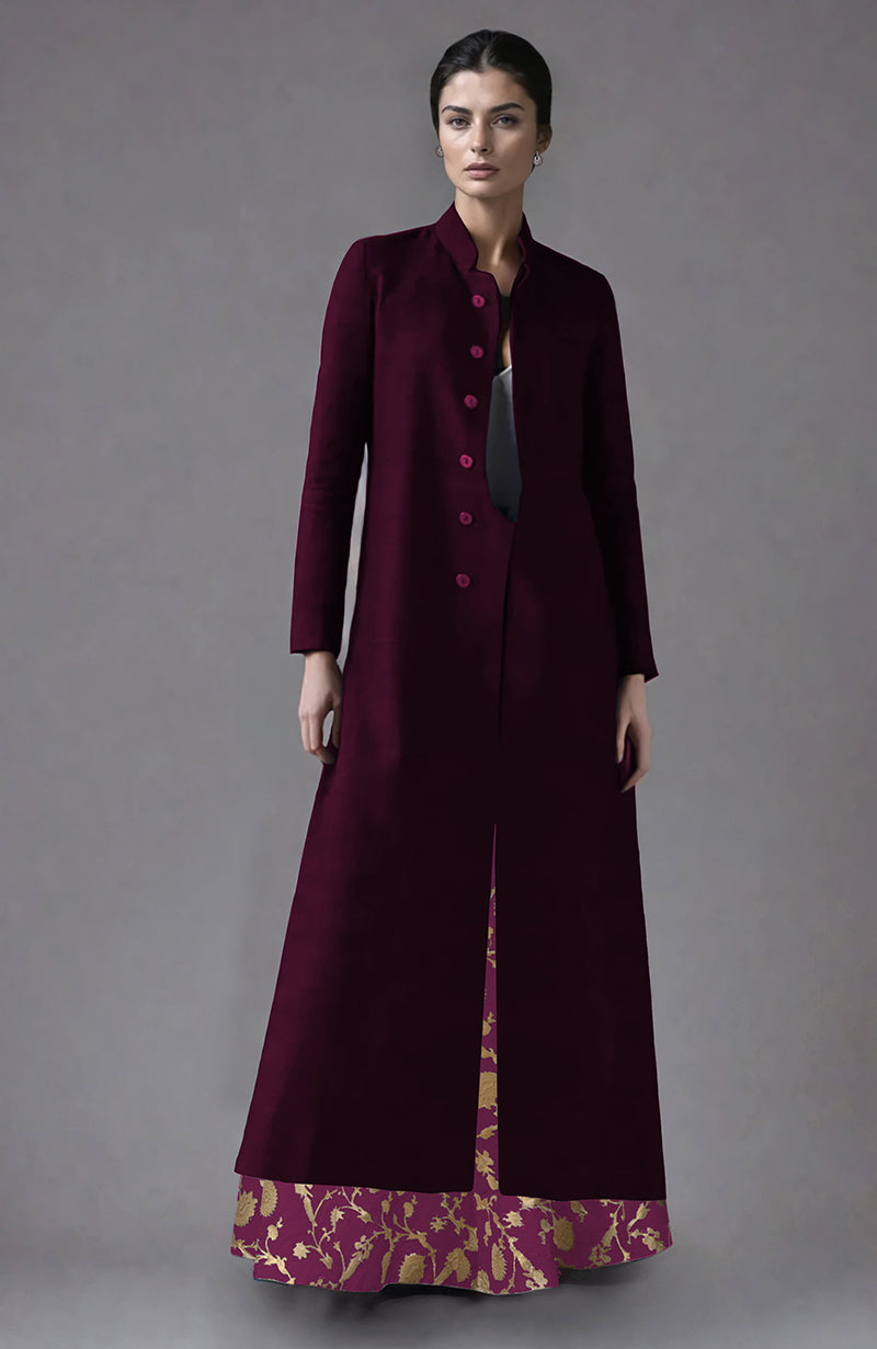 Wine raw silk jacket and skirt set with gold brocade detailing.