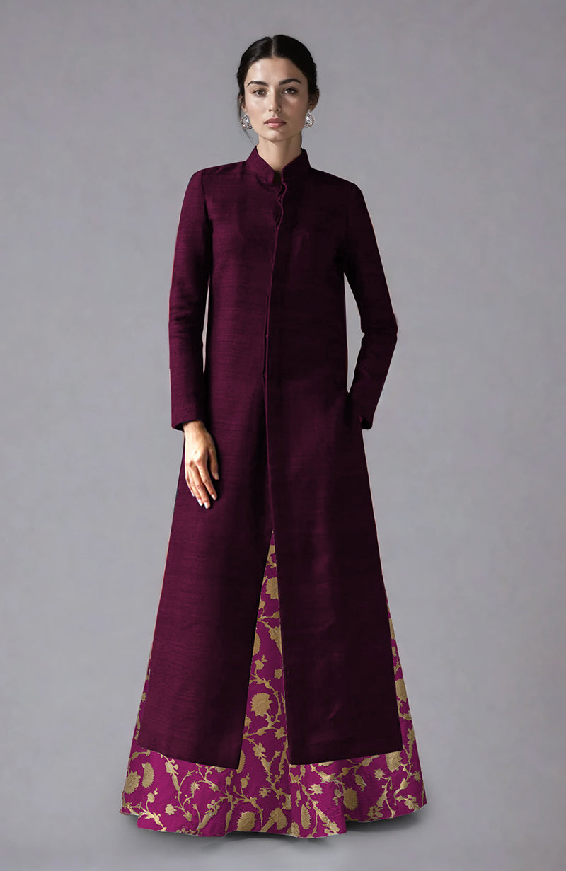 Wine raw silk jacket with a magenta and gold brocade skirt.