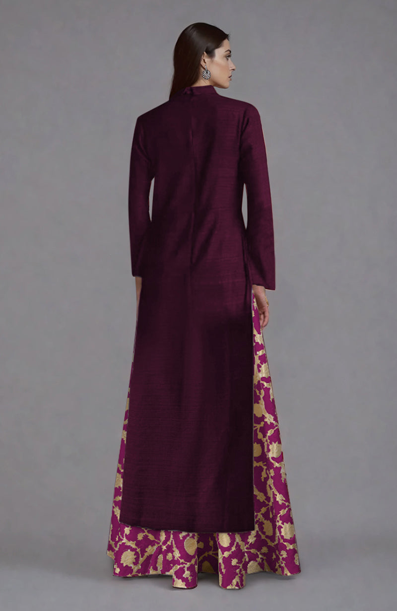Wine raw silk jacket and skirt set with gold brocade detailing.