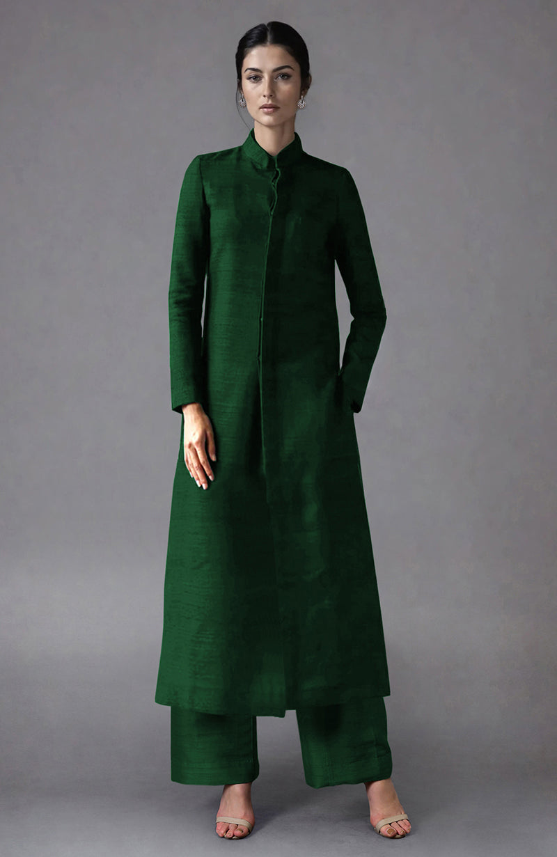 Emerald green raw silk jacket set with a band collar and wide-leg pants.