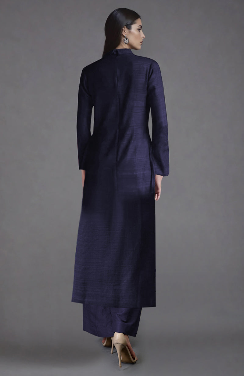 Eclipse Blue Raw Silk Jacket Set with a woman facing away, looking to the right.