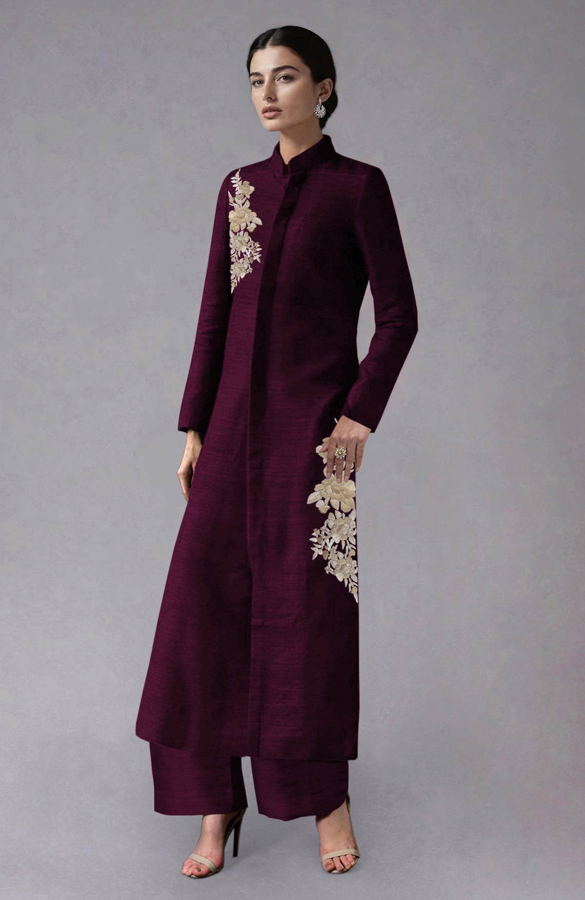 Wine-colored raw silk sherwani jacket with Parsi Gara floral embroidery and wide-leg pants.
