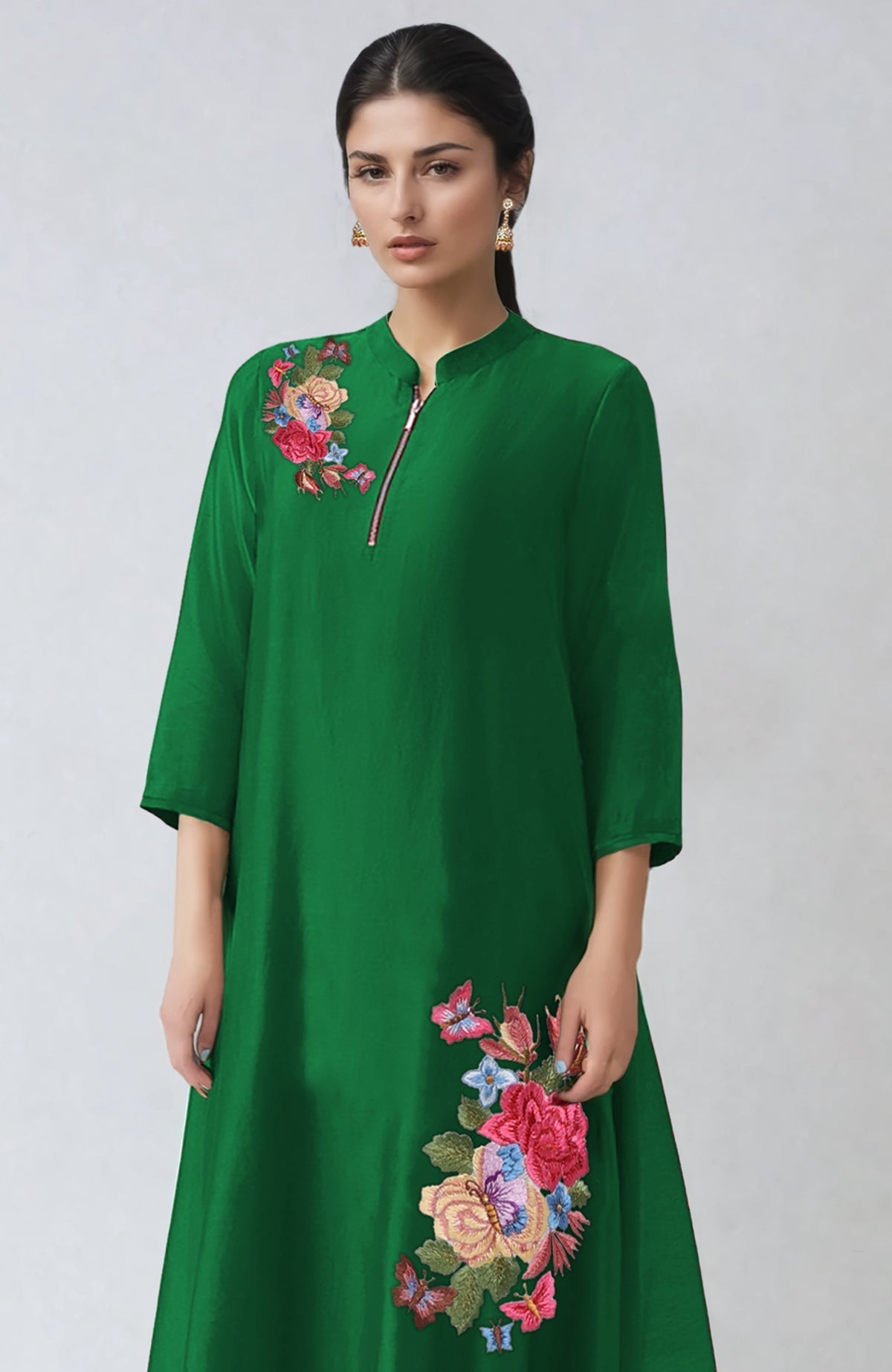 Green kaftan set with Parsi Gara embroidery, band collar, zip placket, and cigar pants.