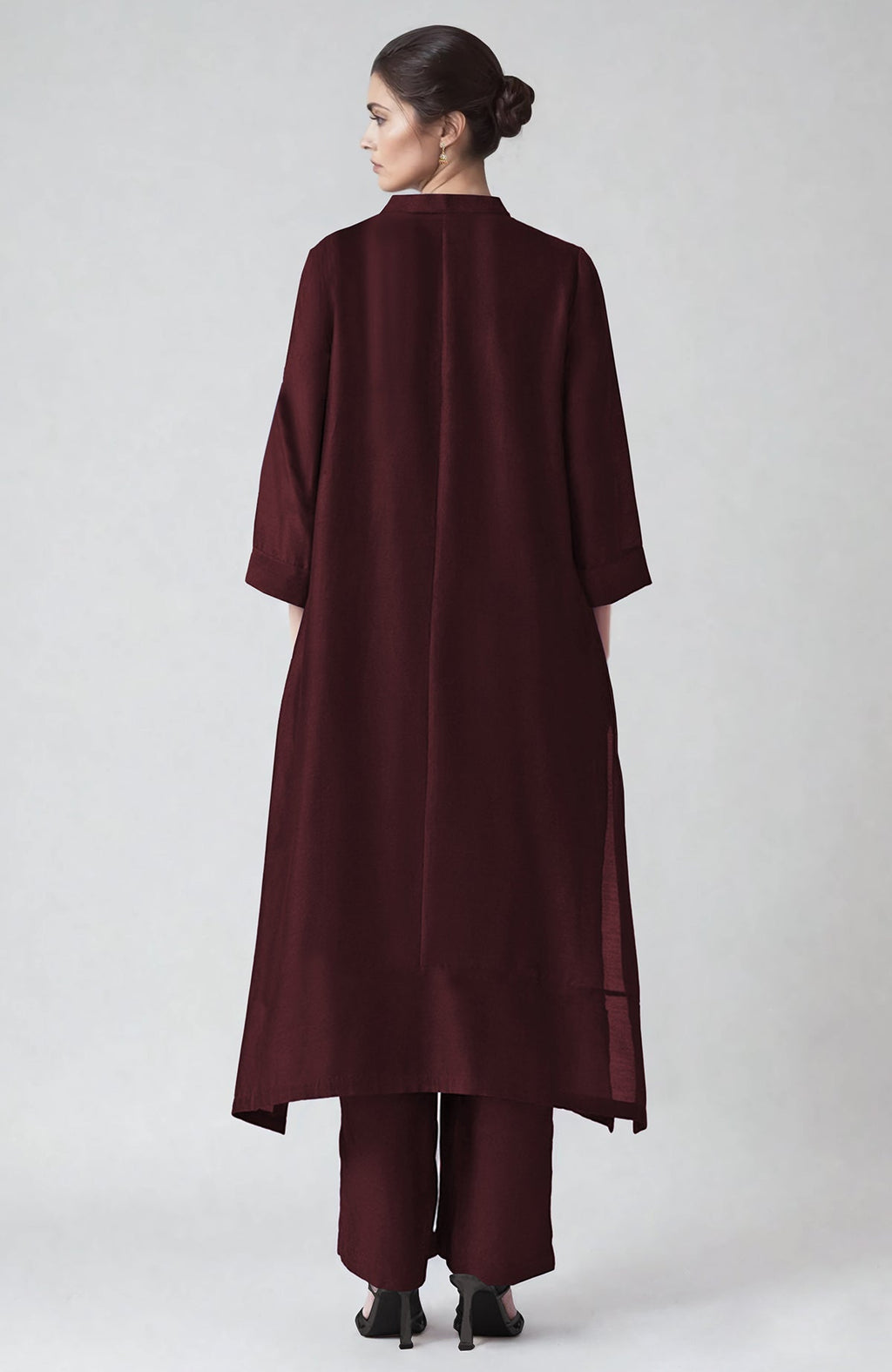 Wine-colored kaftan set with ivory Parsi Gara embroidery and matching straight pants.