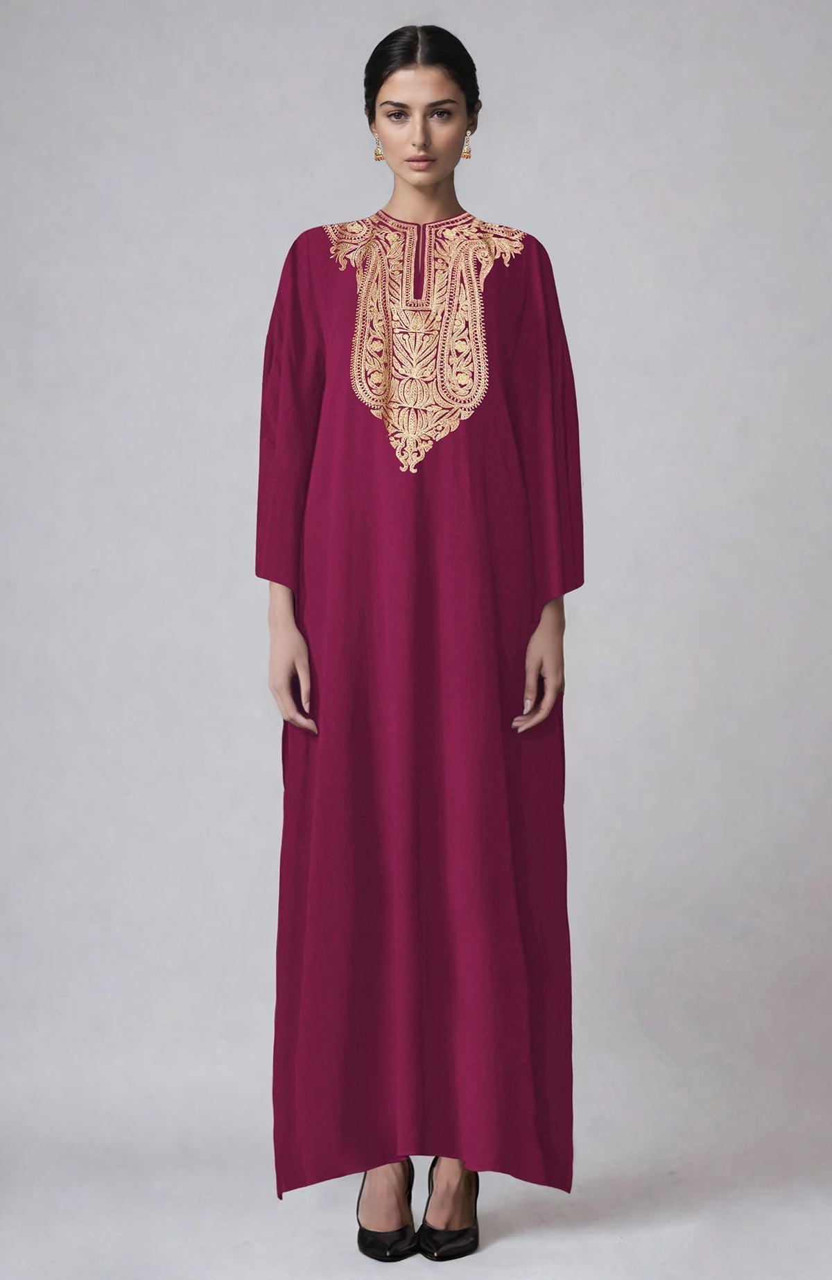 Sangria kaftan with intricate Kashmiri gold Tilla aari embroidery on the placket.