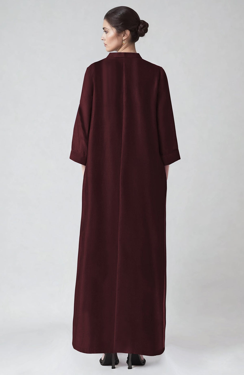 Wine-colored kaftan with ivory Parsi Gara embroidery, band collar, and zip placket.