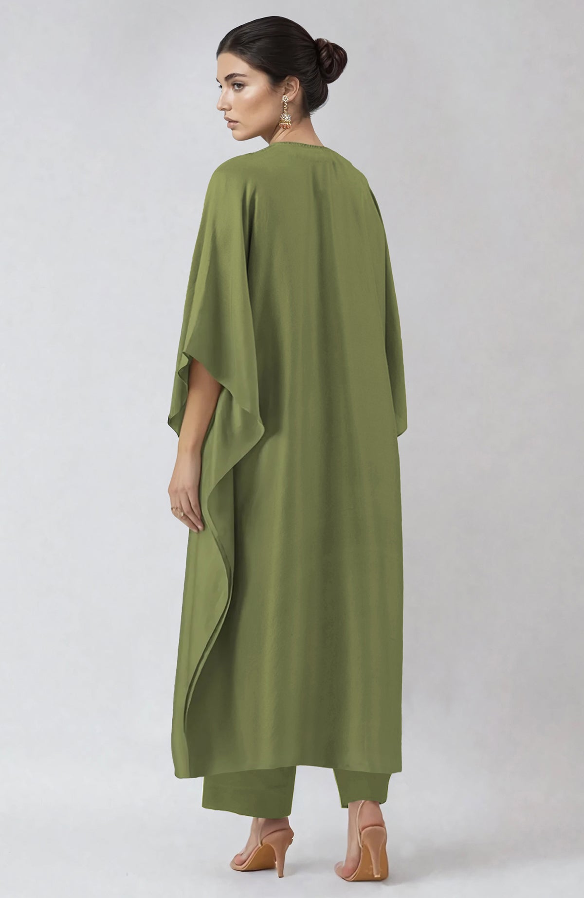 Bog green kaftan with intricate Kashmiri tilla and zardozi embroidery paired with straight pants