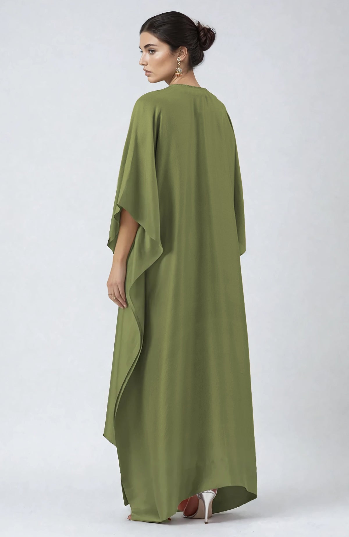 Bog green kaftan with intricate Kashmiri tilla and zardozi embroidery on the placket