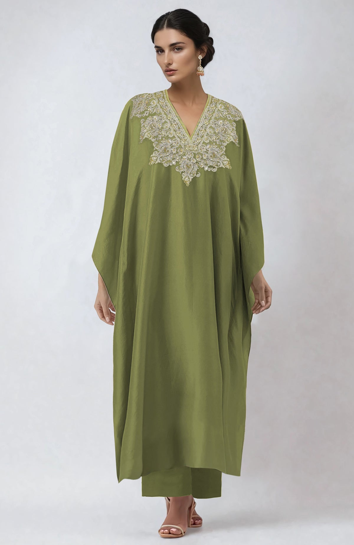 Bog green kaftan with intricate Kashmiri tilla and zardozi embroidery paired with straight pants