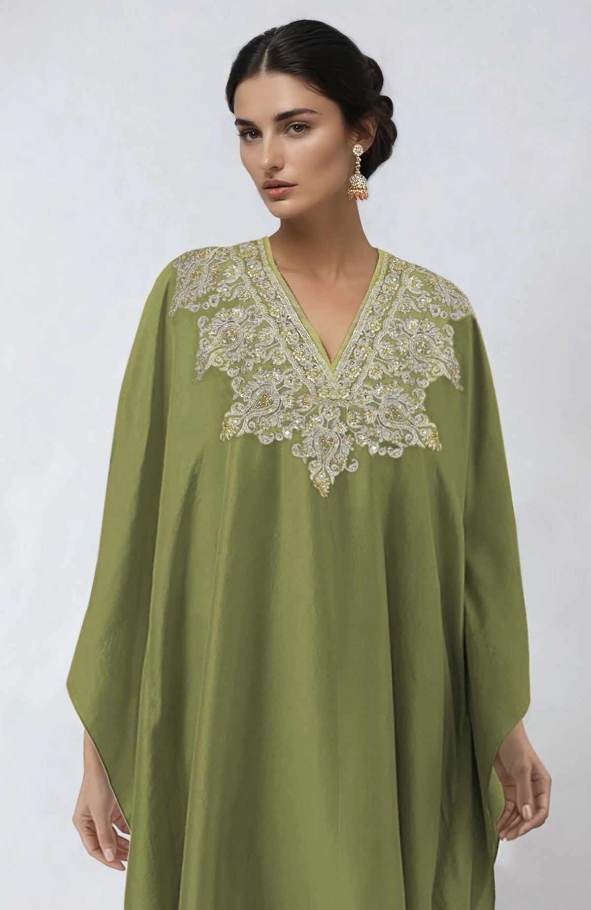 Bog green kaftan set with intricate Kashmiri tilla and zardozi embroidery and straight pants.