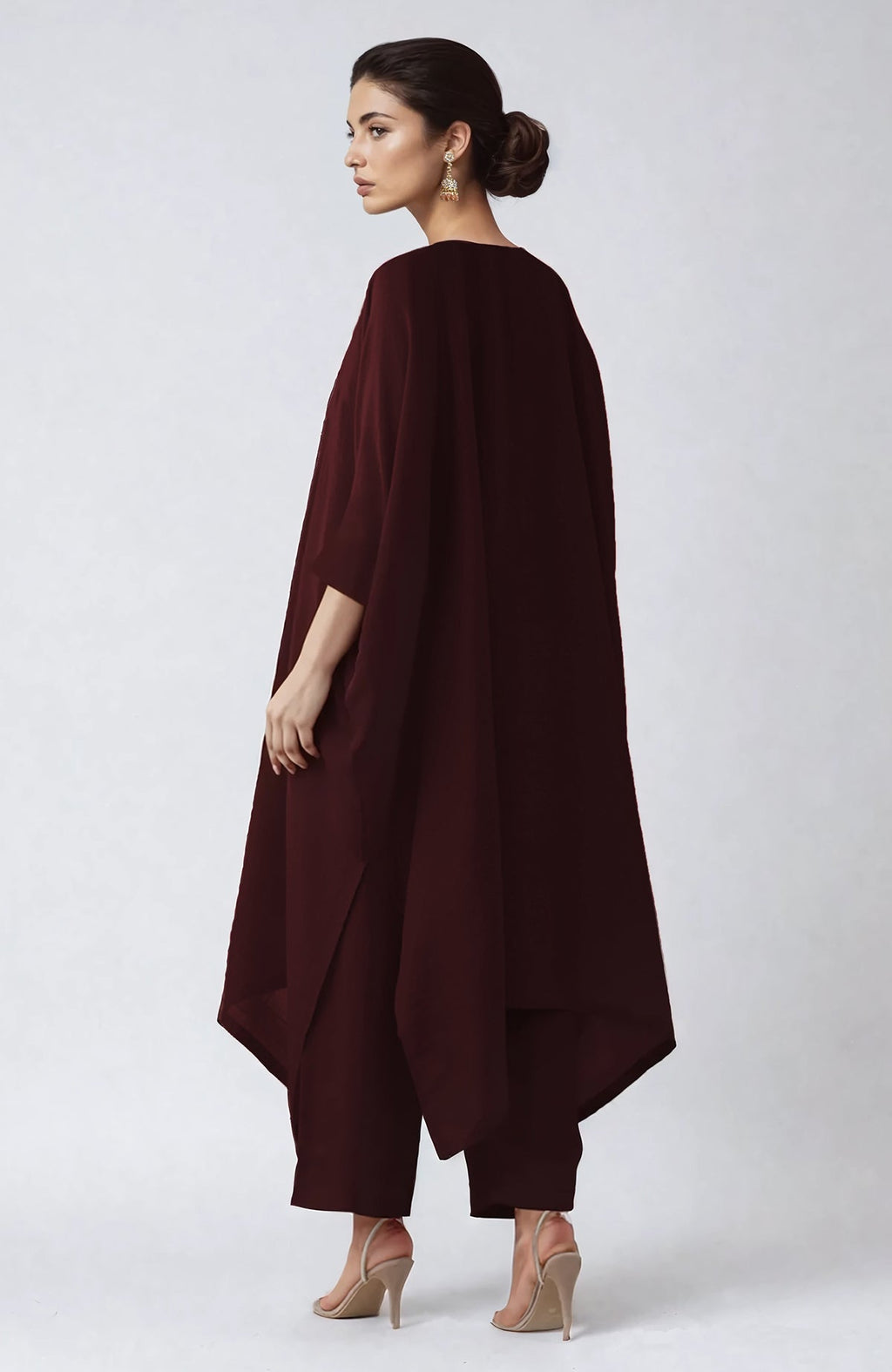 Wine-colored kaftan set with intricate Kashmiri gold Tilla aari embroidery on V neckline
