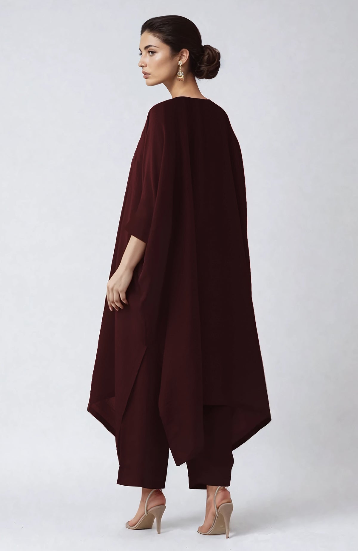 Wine-colored kaftan set with intricate Kashmiri gold Tilla aari embroidery on V neckline