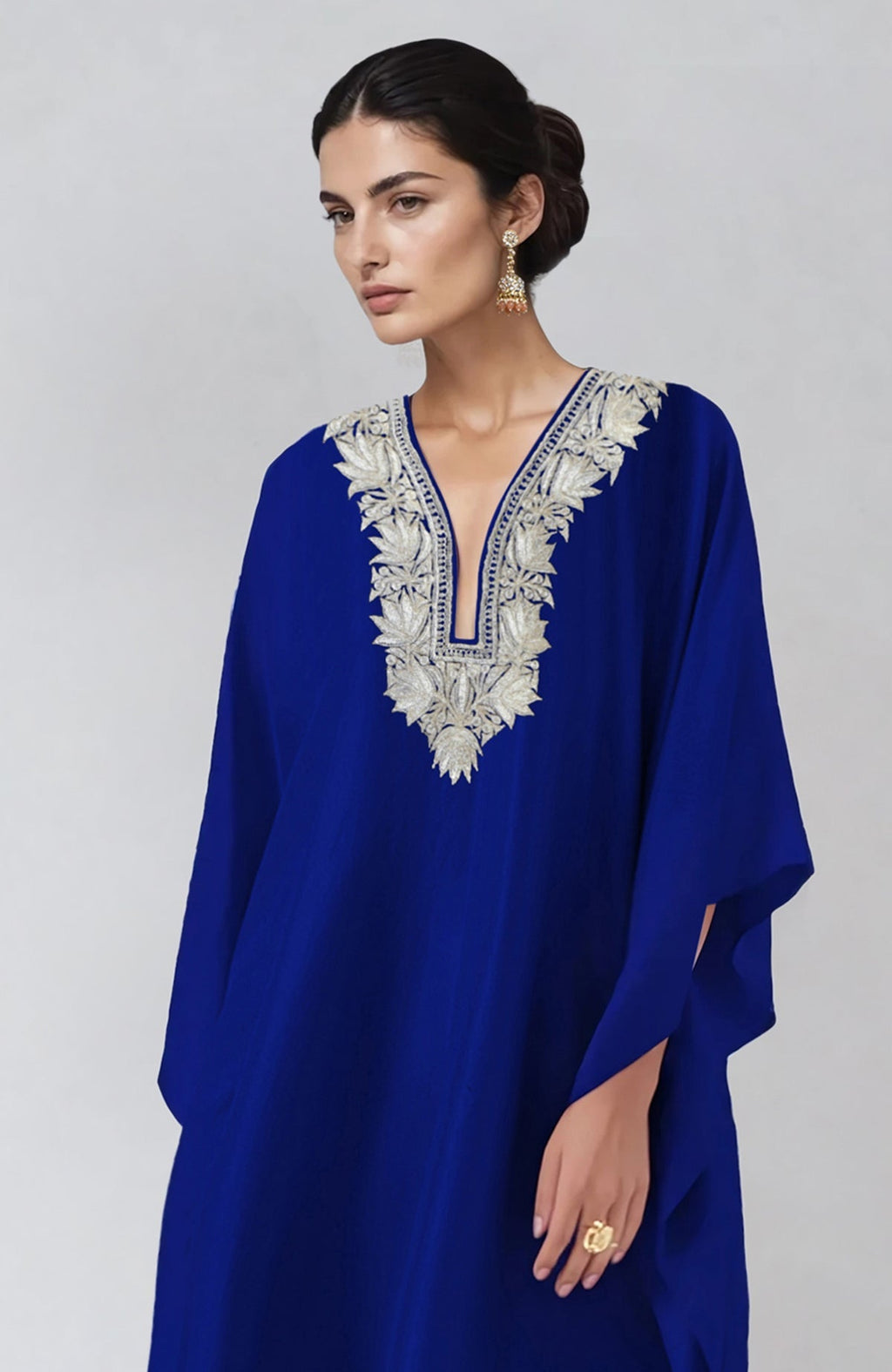 Royal blue kaftan set with intricate silver Kashmiri tilla embroidery and straight pants.