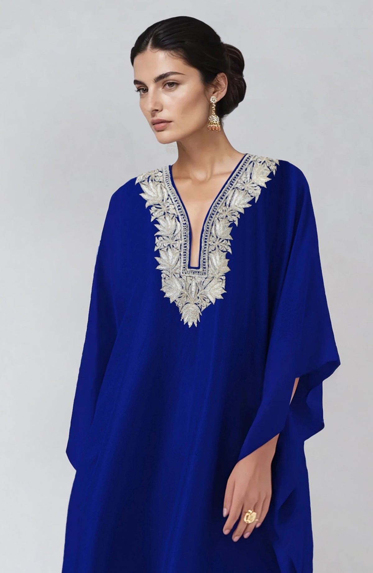 Royal blue kaftan set with intricate silver Kashmiri tilla embroidery and straight pants.