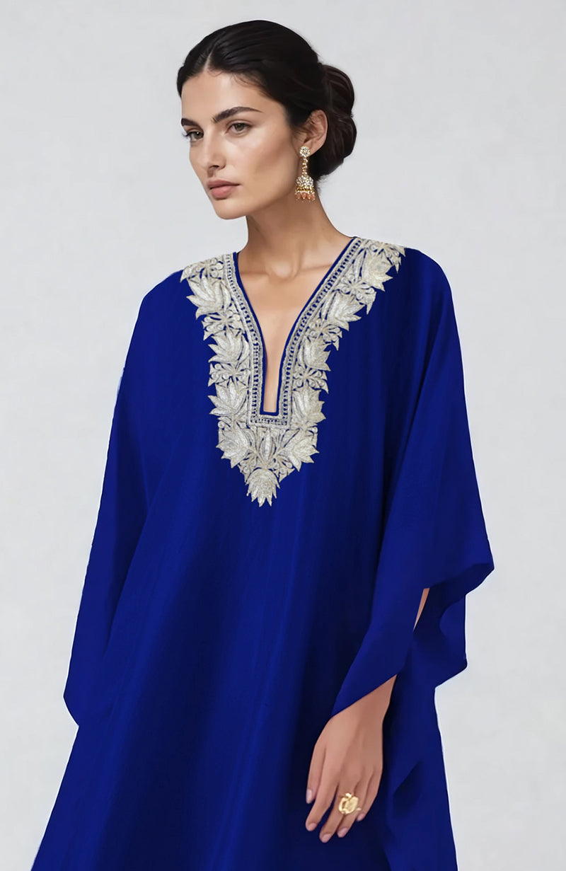 Royal blue kaftan with intricate silver Kashmiri tilla embroidery on the front neckline.