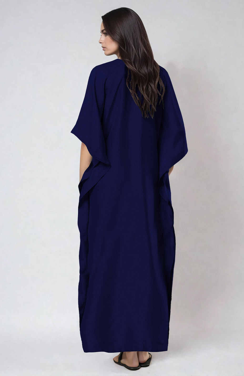 Midnight blue kaftan with floral Resham, papier mache, and Tilla embroidery on neckline