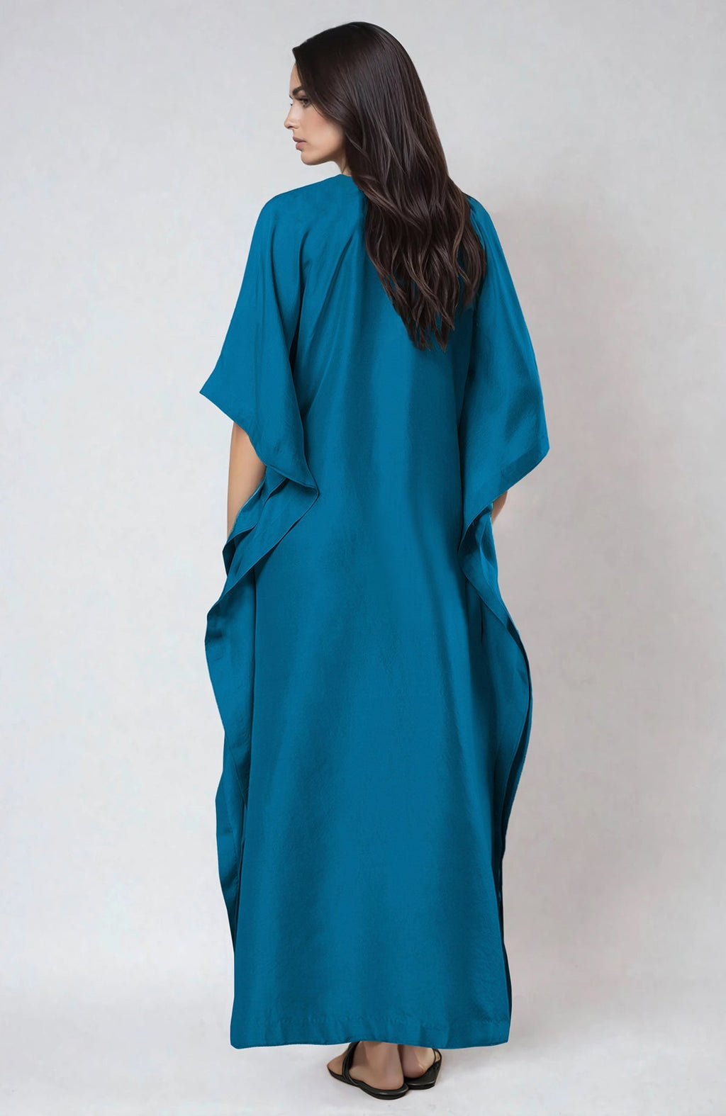 Seaport blue kaftan with round neckline and intricate Kashmiri kashidakari embroidery on front.