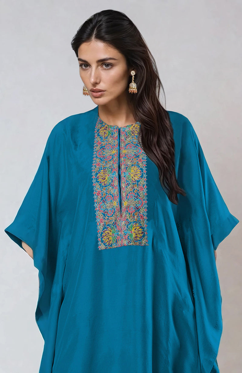 Seaport blue kaftan with round neckline and intricate Kashmiri kashidakari embroidery on front.