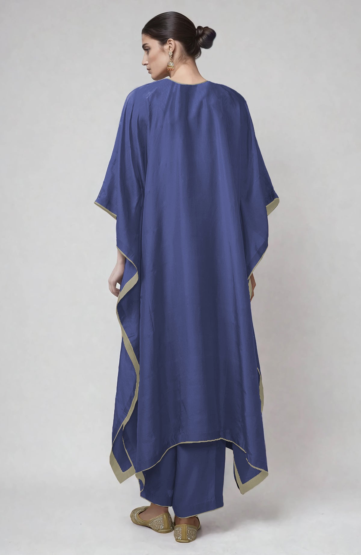 Iris blue kaftan with intricate Kashmiri silver Tilla embroidery and matching straight pants.
