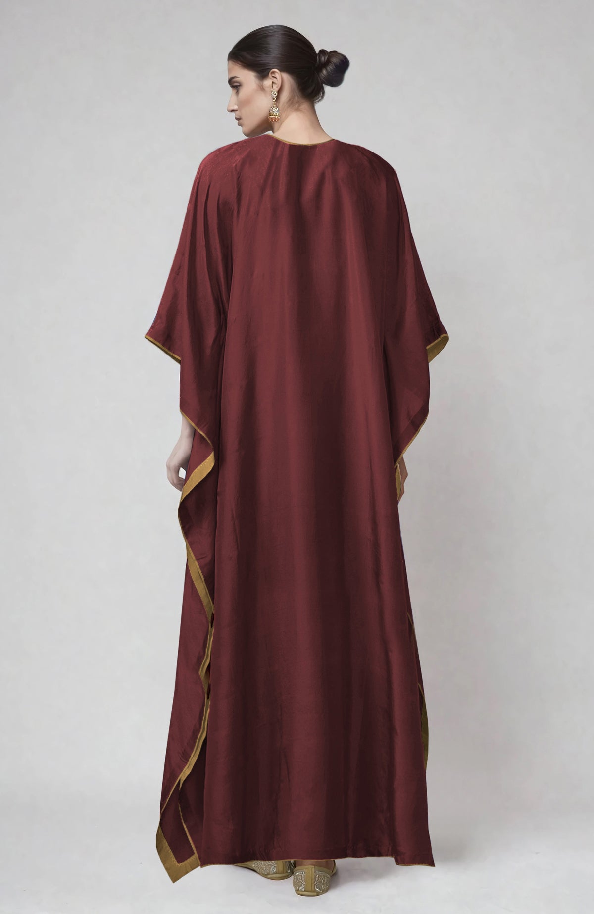 Chutney kaftan with intricate Kashmiri gold Tilla embroidery on placket and cuffs.