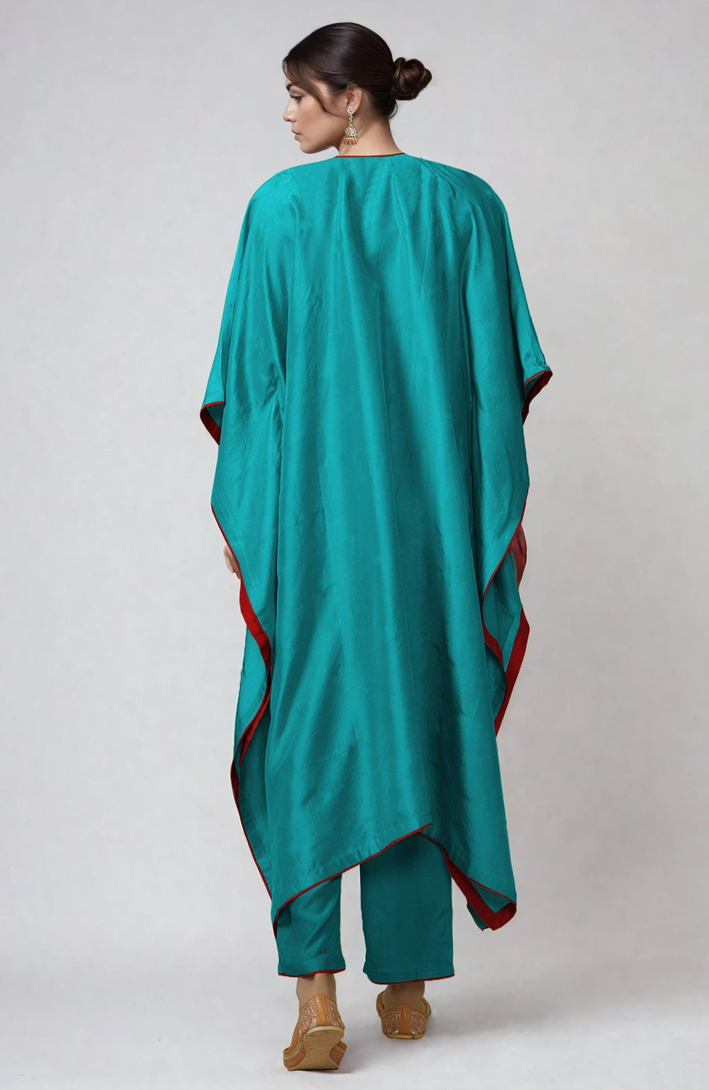 Viridian green kaftan set with intricate Kashmiri kashidakari embroidery on placket and cuffs.