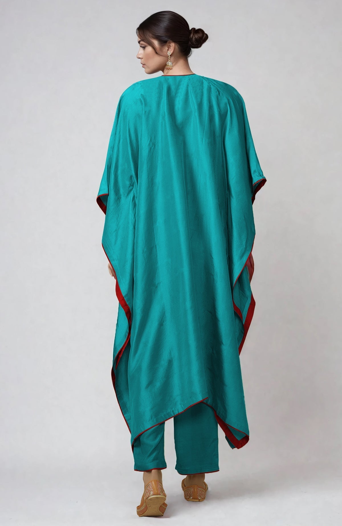 Viridian green kaftan set with intricate Kashmiri kashidakari embroidery on placket and cuffs.