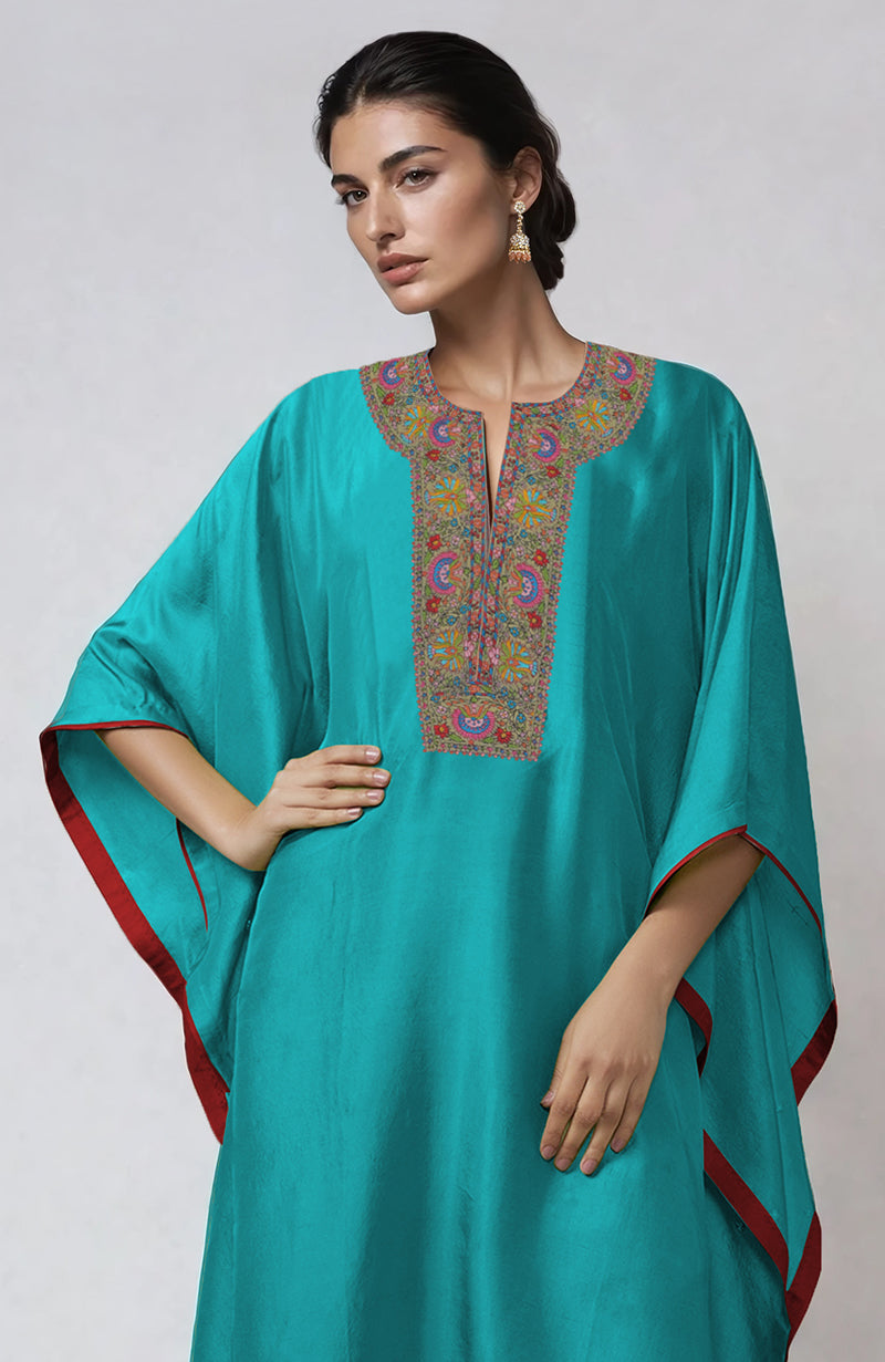 Viridian green kaftan set with intricate Kashmiri Kashidakari embroidery on placket and cuffs.