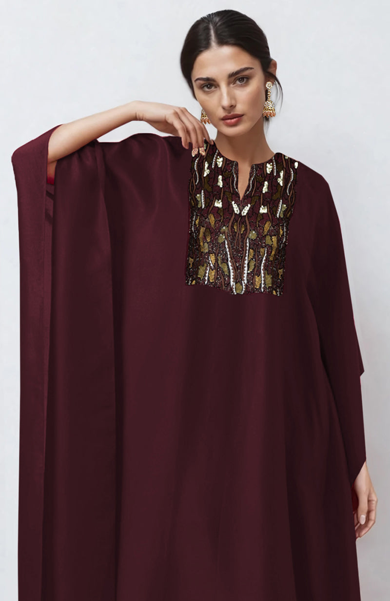 Burgundy kaftan with brown and white resham, bead, and sequin embroidery on front yoke
