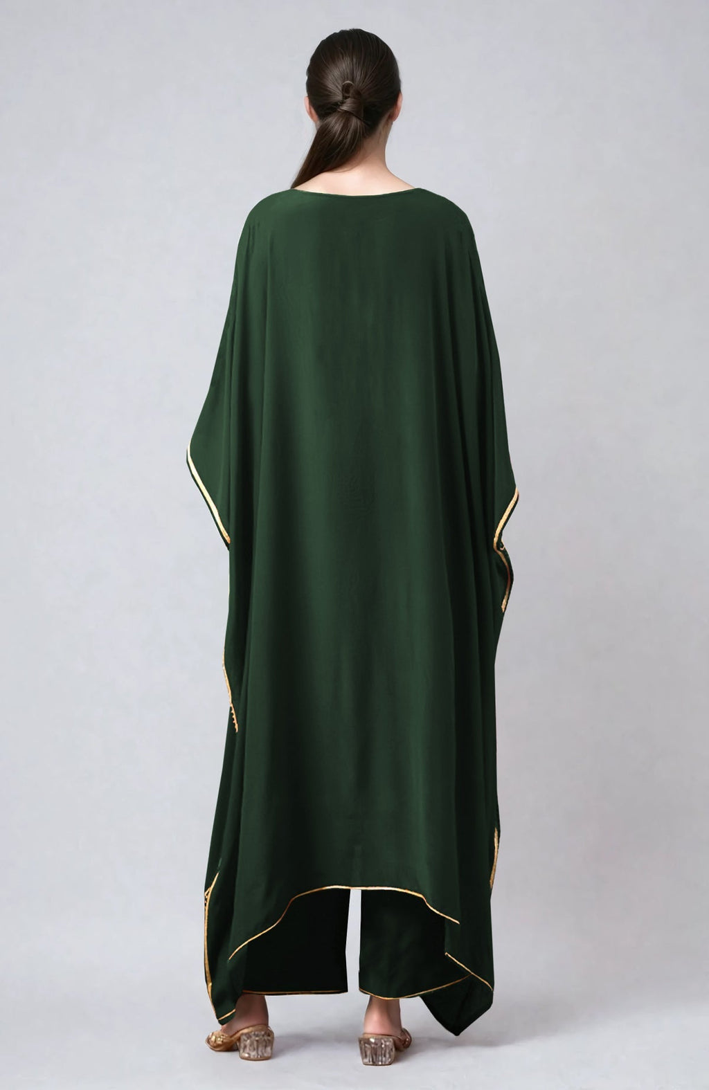 Bottle green kaftan with gold marori and resham embroidery paired with straight pants.