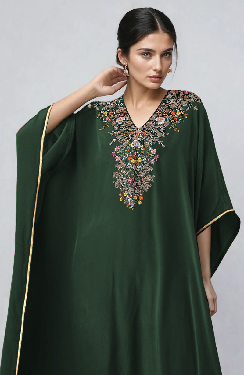 Bottle green kaftan set with gold marori and resham embroidery and straight pants.