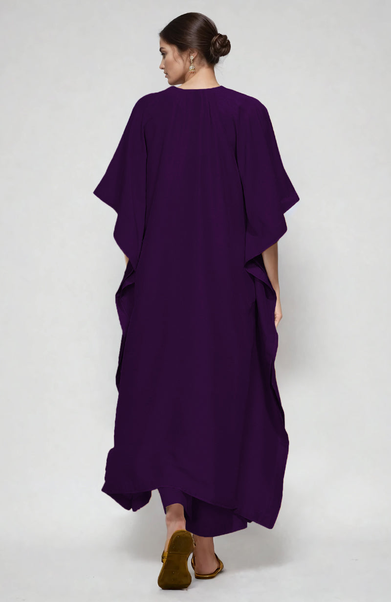 Plum kaftan set with white and beige paisley Aari embroidery on neckline and straight pants.