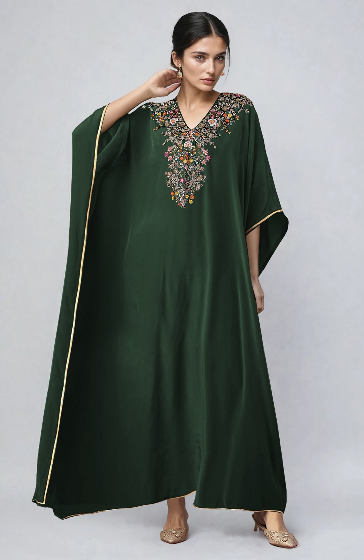 Bottle green kaftan with gold marori and resham embroidery and a V-neck design