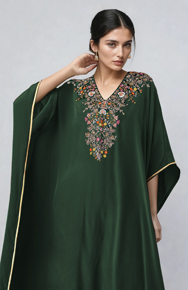 Bottle green kaftan with gold marori and resham embroidery and a V-neck design.