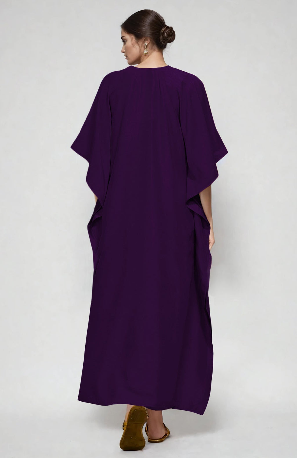 Plum kaftan with white and beige paisley Aari embroidery along the neckline.