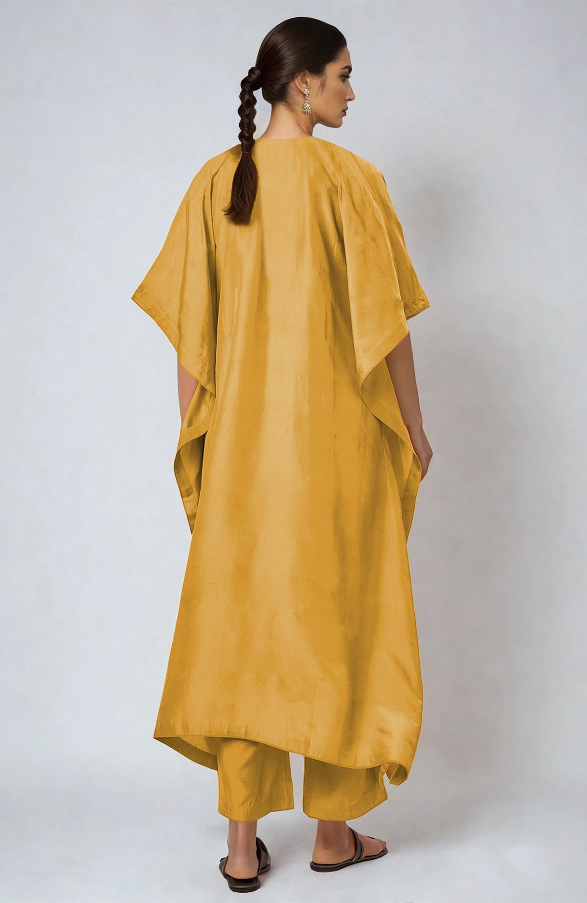 Yellow kaftan with multi-colored Parsi Gara embroidery on placket and cuffs, paired with straight pants