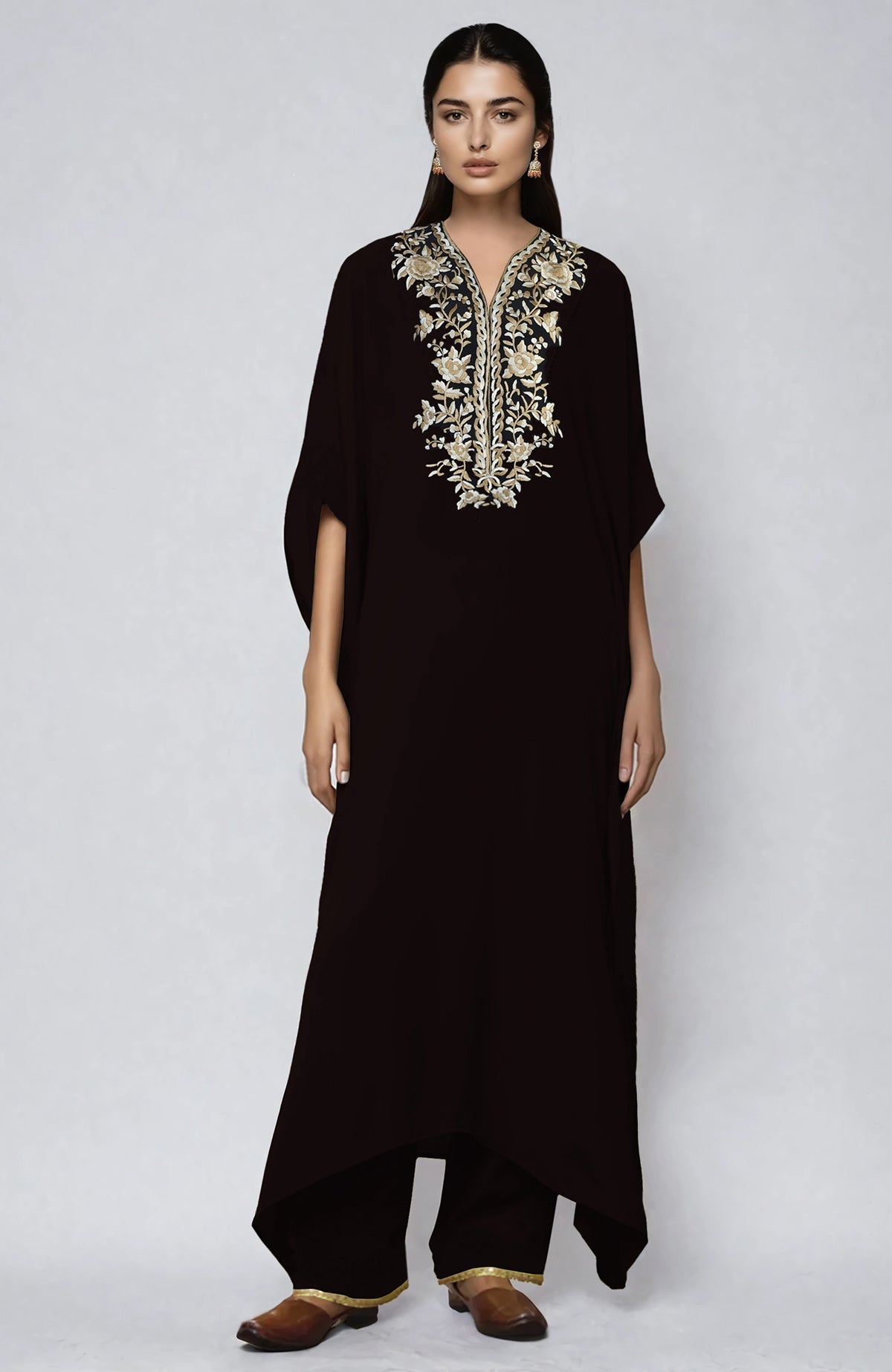 Black kaftan with ivory and beige Parsi Gara embroidery on placket and cuffs, paired with straight pants