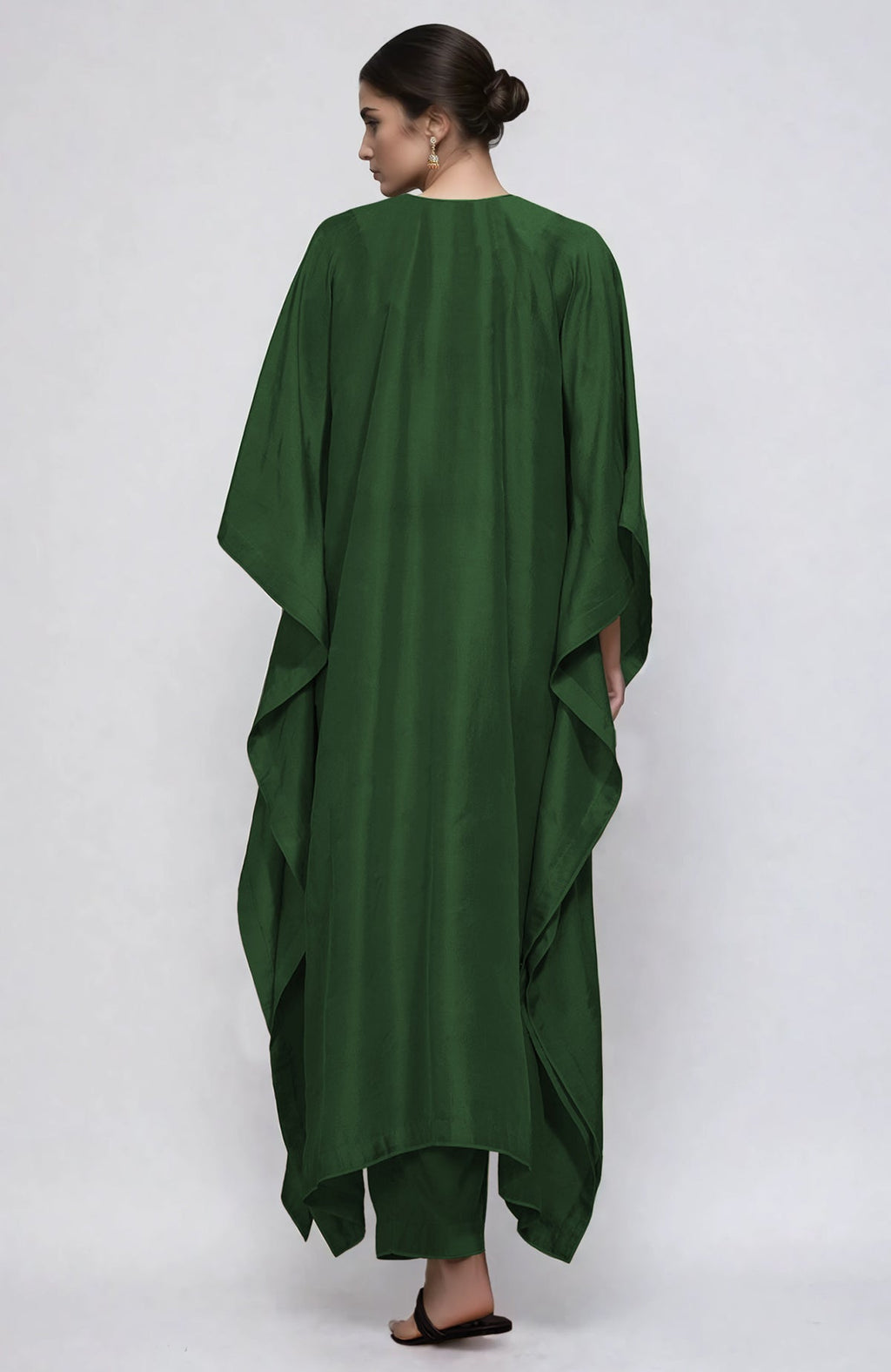 Emerald green kaftan set with silver Kashmiri Tilla embroidery on placket and cuffs, paired with straight pants